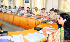 District Magistrate Nidhi Pandey takes a meeting of administrative officals in Haridwar on Tuesday.