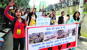 Activists of the ABVP raise the slogan Salute the Indian Army in Shimla on Tuesday.