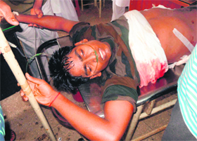 One of the policemen injured in the ambush at a hospital in Kathikund on Tuesday.