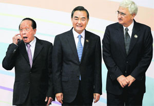 (From right) Foreign Minister Salman Khurshid with his Chinese counterpart Wang Yi and Cambodian counterpart Hor Namhong at the 3rd East Asia Summit Foreign Ministers Meeting in Bandar Seri Begawan, Brunei, on Tuesday.