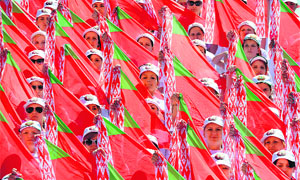 Teenagers take part in a parade rehearsal in Minsk on the eve of Belarus Independence Day on Tuesday.