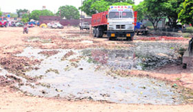 A road in a deplorable condition at the Jahajgarh market
