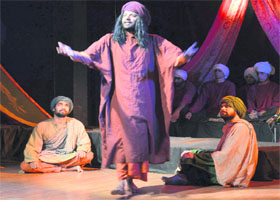 Remembering the saint: Artistes stage the play, Kabir, during the Annual Punjabi Theatre festival at Virsa Vihar in Amritsar on Wednesday