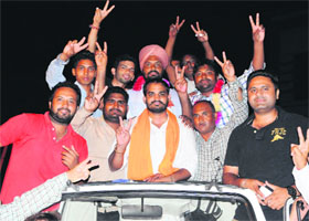Victory march: The candidates, who won the panchayat elections at Ranjit Vihar Gram, celebrate in Amritsar on Wednesday