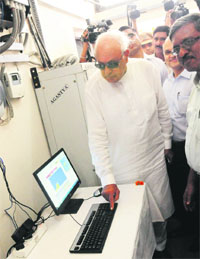 Union Minister Farooq Abdullah inaugurates a solar plant at Model Jail, Burail, on Wednesday.