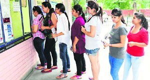 Students queue up to buy prospectuses at a college in Chandigarh on Wednesday. 