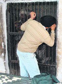 A relative speaks to a prisoner in Patiala jail. A file photo