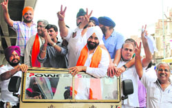 Newly elected Mayor Bhupinder Singh (third from right) during a victory procession in Panipat on Wednesday.  Tribune photo: Ravi Kumar