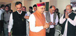 BJP leader PK Dhumal goes to attend a meeting at the party office in Shimla on Wednesday. Photo: Amit Kanwar