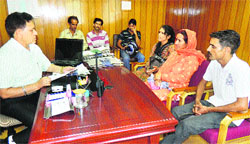 Residents of Majiali village (Rewalsar) meet IGP PL Thakur in Mandi on Wednesday Photo: Jai Kumar