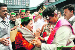 Pratibha Singh being greeted by Maheshwar Singh, president, Himachal Lokhit Party, at Holly Lodge in Shimla on Wednesday. Photo: Amit Kanwar