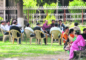 Teaching staff of Government Degree College, Bhaderwah, in the college lawn. Students have withdrawn their names from the college due to staff shortage. 