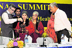 Chief Minister Omar Abdullah and Secretary, Health and Family Welfare, Keshav Desiraju (right) inaugurate the National Summit on Best Practices and Innovations in Public Healthcare Systems at the Sher-i-Kashmir International Conference Centre in Srinagar on Wednesday