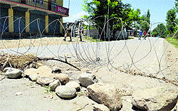 Security forces have sealed roads leading to Markundal village in Bandipora