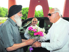 Union Minister Farooq Abdullah with CM Parkash Singh Badal in Chandigarh on Wednesday. 