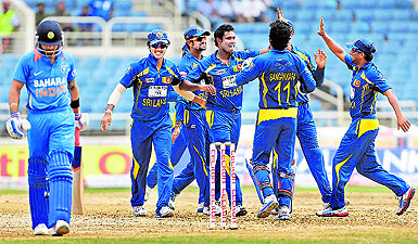 Sri Lanka celebrate as they dismiss Virat Kohli  their nemesis for quite some time now  in Kingston on Tuesday. Virat has failed to fire so far in the tri-series