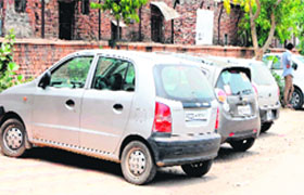 Vehicles parked illegally outside the district courts complex in Amritsar on Thursday