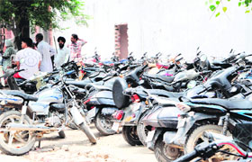 Vehicles parked illegally outside the district courts complex in Amritsar on Thursday