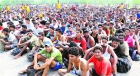aspirants from Ferozepur and Fazilka districts awaiting their turn at the rally .