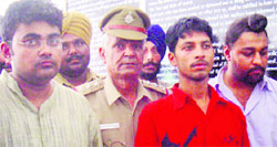 A file photo of three of the four accused, Kanav Arora, Shiv Kumar and Mandeep Singh, in police custody in Chandigarh