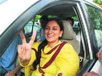 Upender Ahluwalia flashes the victory sign after her election as Panchkula Mayor on Thursday. 
