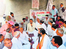 INLD leader Abhey Singh Chautala meets Sant Gopal Dass at Sonepat on Thursday. 
