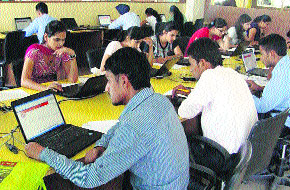 The students participate in an on-line test at the job fair organised by the Technology Education Research Integrated Institution (TERII). 
