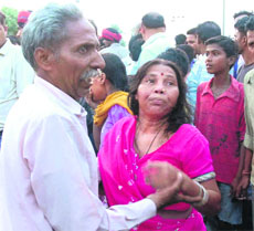 Wailing family members of the deceased Krishan Bharti in Jalandhar on Thursday.