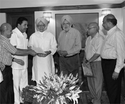 Delegation members with Prime Minister Manmohan Singh in New Delhi on Thursday.