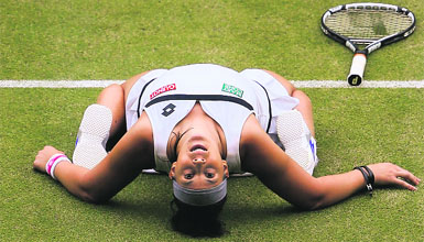 Marion Bartoli exults after making it to the final on Wednesday. She will need to put her best foot forward to beat giant-killer Lisicki in the final. 
