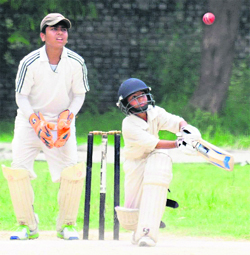 Players in action during a cricket match at Guru Nanak Public School, Sector 36, in Chandigarh on Friday.