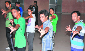 Ankan Sen, winner of dance reality show Just Dance (second from right) with trainees during a dance workshop at Rotary Club in Jammu on Friday.
