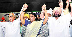 Haryana Chief Minister Bhupinder Singh Hooda, Congress leaders Renuka Chaudhury and Capt Amarinder Singh in New Delhi on Friday