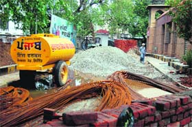 The main gate of the Jallianwala Bagh Martyrs Memorial Civil Hospital has been closed as construction material is lying in front of it in Amritsar