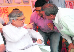 MP Pawan Kumar Bansal interacts with residents of Badhari village in Sector 52, Chandigarh, on Saturday.