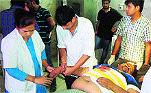 Doctors attend to Nissing Municipal Council chairman Nagesh Goel at Kalpana Chawla Medical College Hospital in Karnal on Saturday