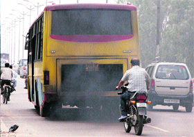 Smoke being emitted by a bus of Jalandhar City Bus Service in front of DAV College, Jalandhar, on Saturday.