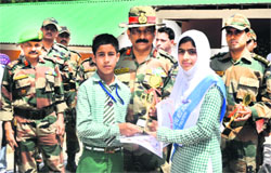 Winners of the quiz competition being felicitated by the Army in Srinagar on Saturday.