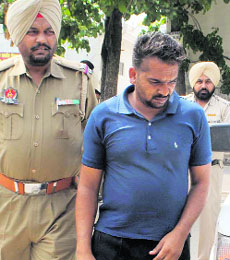 Sukhwinder Bobby being produced in a court in Mohali on Saturday. 