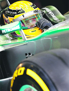 Mercedes driver Lewis Hamilton of Britain closes his visor at the start of the second practice session of the German F1 Grand Prix at the Nurburgring racing circuit on Saturday. 