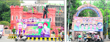 Hoardings welcoming BJP president Rajnath Singh at Hall Gate Chowk and the historic Town Hall building (right) in Amritsar on Sunday.