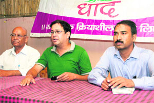 Office-bearers of "Dhad", a voluntary organisation, address a press conference in Dehradun on Saturday.