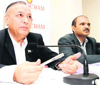 DS Rawat, Secretary General, and Dr CS Rao, Chief Economist of Assocham, addresses mediapersons in Dehradun on Sunday.
