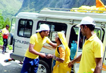 A team of Voluntary Action and Research and Social Activity evacuates stranded pilgrims from the Badrinath area. 
