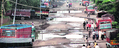 The pitiable condition of the road in Transport Nagar. A scheme regarding the road has been transferred by the Municipal Corporation to the Jalandhar Improvement Trust.