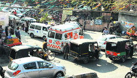 An ambulance stuck in a traffic jam outside the Civil Hospital on the Old GT road in Jalandhar.