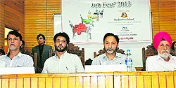 Dignitaries at the mega job fest 2013 organised at the University of Kashmir in Srinagar on Sunday