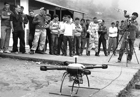 A drone device, fitted with a camera, is being used to search for survivors of Uttarakhand flood victims in Guptkashi.