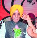 BJP president Rajnath Singh in a saffron turban.