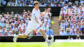 Andy Murray sends down one of the several winners against Novak Djokovic on Sunday at Wimbledon.